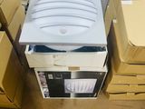 a stack of boxes with a computer on top of it
