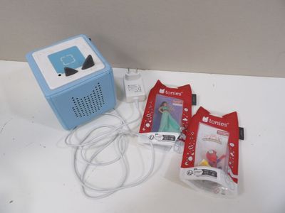 a small blue and white box and some other items on a table