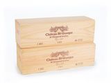 two wooden boxes of wine are stacked on top of each other