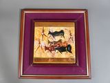 tableau encadré représentant un homme à cheval et une femme à cheval