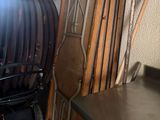 a lot of chairs and a table in a room