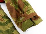 the back of a camouflage jacket with buttons on a white background
