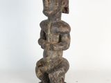 a statue of a woman holding a baby in her arms