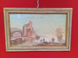 la photo d'un tableau accroché à un mur rouge