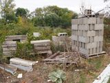 a lot of junk in the yard of a house