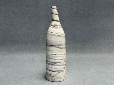Bouteille en céramique terre mélée