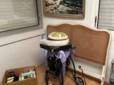 a table with a cake on top of it in a room