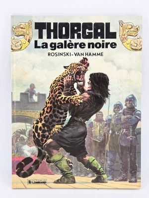 the cover of a book with a picture of a man wrestling a leopard