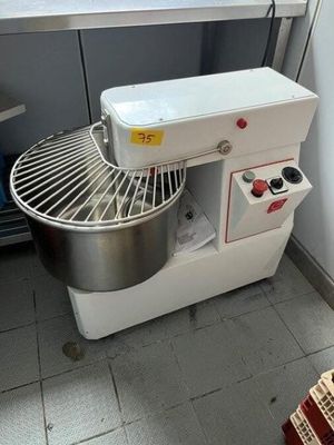 an image of a kitchen with a mixer and a counter