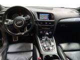 the interior of a car with a steering wheel, dashboard, and dashboard controls