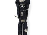 an image of a black voodoo doll with a knife in its hand