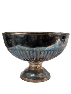 a silver bowl with a blue design on it
