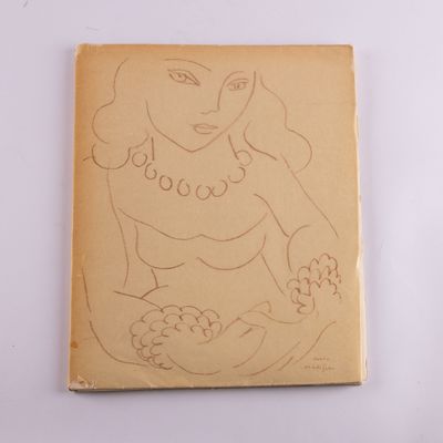 an old book with a drawing of a woman on it