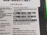 the back of a cell phone with a bar code on it