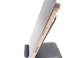 a close up of a cell phone on a stand