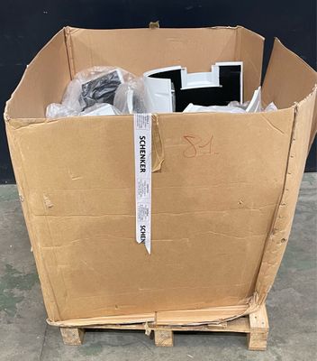 a cardboard box with a computer in it on a pallet