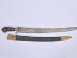 pair of two knives on a white surface one has a black handle and the other has a gold handle
