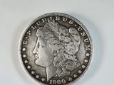 a close up of a coin with a woman ' s face on it