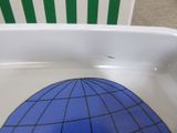 a picture of a toilet with a blue globe on it