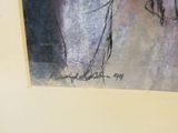 une image d'un tableau sur le mur d'une pièce