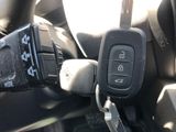 a close up of a car key in the driver ' s seat