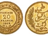 une pièce d'or portant l'image d'un homme et d'une femme