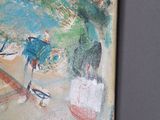 a painting hanging on the wall of a room