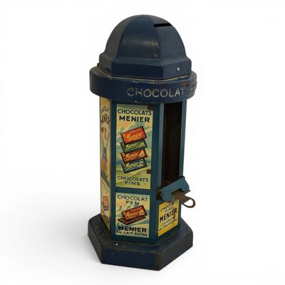 a blue and black fire hydrant with chocolate labels on it