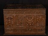 an antique wooden chest with carvings and carvings on the sides