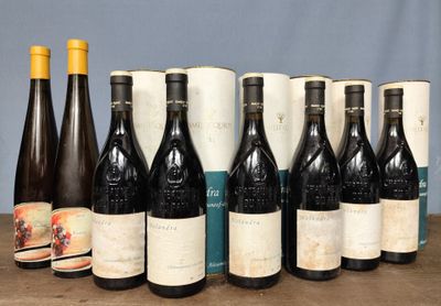several bottles of wine are lined up on a table