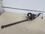 a picture of a corded hedger on a table