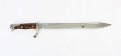 a knife that is laying on a white surface