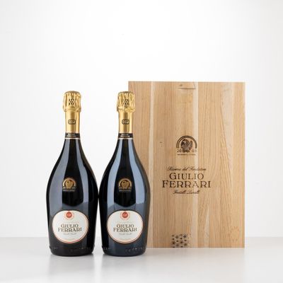 two bottles of wine in front of a wooden box