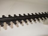 a close up of a train track with a plastic container