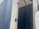 a truck that has a large container in the back of it