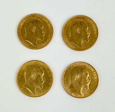 four gold sovereigns, one of which is a sovereign and one of which is a sovereign