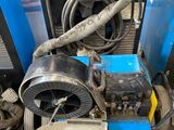 a picture of a machine that is sitting in a garage