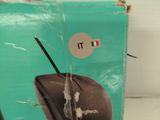 a box with a computer mouse in it sitting on a table
