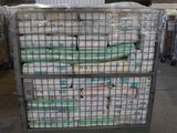 a large metal cart with a lot of boxes on top of it