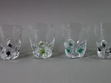 six glasses that are lined up in a row