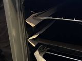 an open oven door with a bunch of papers inside of it