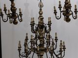 a chandelier that is hanging from the ceiling