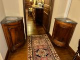 a rug on the floor in the hallway of a house