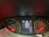 a close up of a car dashboard with a speedometer