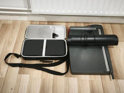 a gym mat, a mat, and a bag on the floor