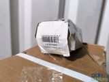 a box with a barcode on it sitting on top of a cardboard box