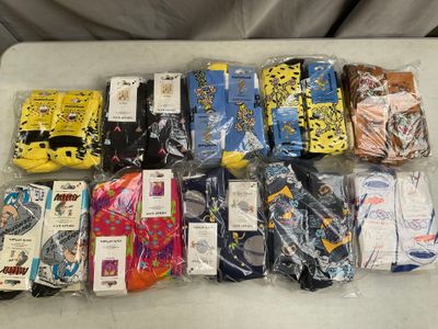 many pairs of men ' s socks on a table