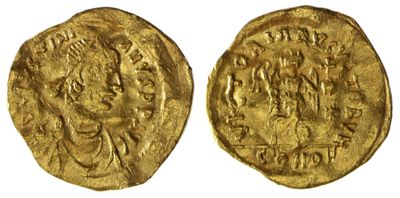 une pièce d'or portant l'image d'un homme et d'une femme