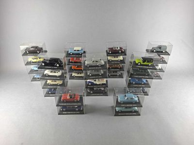 a lot of small cars that are in a display case