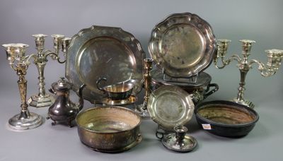 many different types of silverware on display on the table